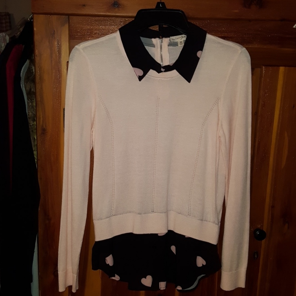 Pink and black sweater